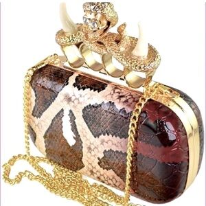 Vintage, SKULL ring clutch unicorn.